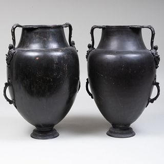 Near Pair of Classical Style Black Painted Metal Water Vessels