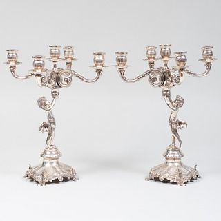 Pair of Continental Silver Figural Five-Light Candelabra