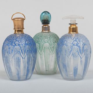 Three Lalique Patinated Glass Scent Bottles