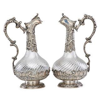 PAIR OF FRENCH SILVER MOUNTED CLARET JUGS