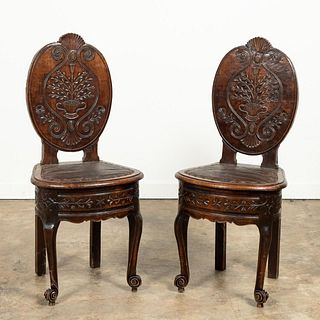 PAIR, CARVED CONTINENTAL LEATHER SEAT HALL CHAIRS
