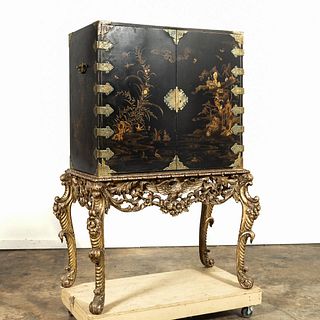 CHINOISERIE LACQUER CABINET ON ORNATE STAND