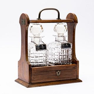 OAK TANTALUS WITH DECANTERS & STERLING SILVER TAGS