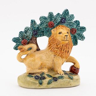 STAFFORDSHIRE LION FIGURE WITH GREEN FLORALS