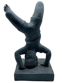 Vintage Sculpture of a boy doing a Handstand