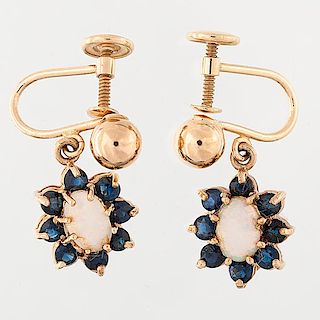 Opal and Sapphire earrings in 14 Karat Yellow Gold 