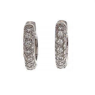 Pair of creole earrings in 18 kt white gold