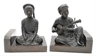  Pair of Bronze Figural Bookends, both playing instruments, height 10 inches