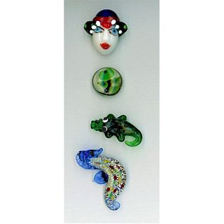 A SMALL CARD OF DIVISION THREE LAMPWORK GLASS BUTTONS