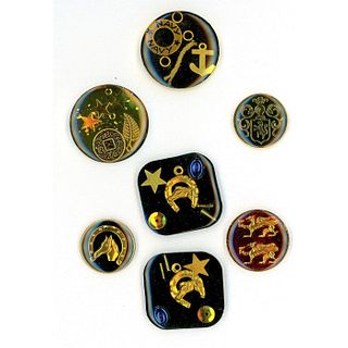 A SMALL CARD OF DIVISION THREE "JUNQUE" BUTTONS
