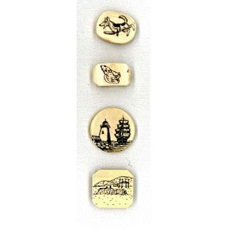A SMALL CARD OF NATURAL MATERIAL SCRIMSHAWED BUTTONS
