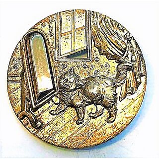 A DIVISION ONE BRASS CAT AND THE MIRROR BUTTON