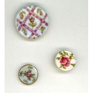 A SMALL CARD OF HAND PAINTED PORCELAIN BUTTONS