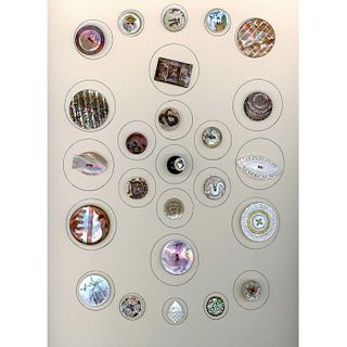 A CARD OF DIVISION 1 ASSORTED PEARL BUTTONS