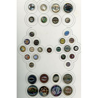 A CARD OF DIVISION ONE DESIGN UNDER GLASS BUTTONS