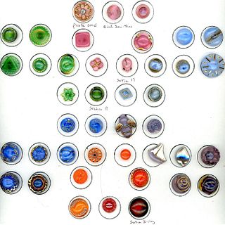 A CARD OF DIVISION THREE MOONGLOW GLASS BUTTONS