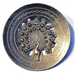A DIV. 1 RARE PIERCED STEEL AND BRASS PEACOCK BUTTON