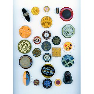 A CARD OF ASSORTED DIVISION THREE BAKELITE BUTTONS