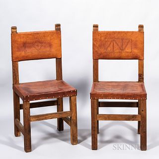 Two Leather-upholstered Chairs
