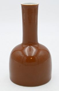 Chinese Brown Glazed Vase
coffee brown color having long neck
bottom signed with six character marks
height 7 1/2 inches