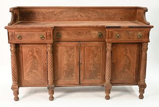 Sheraton Mahogany Sideboard in Two Parts
top section having carved gallery on shaped top on conforming case, having three drawers and four doors with 