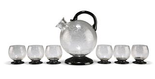 AN ETCHED AND BLACK GLASS DRINKS SET, POSSIBLY ORREFORS, comprising spheric