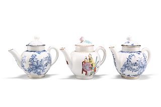 THREE ROYAL WORCESTER MINIATURE TEAPOTS, including two blue and white. (3) 
