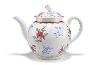 A WORCESTER TEAPOT AND COVER, the segmented ground filled with coloured and