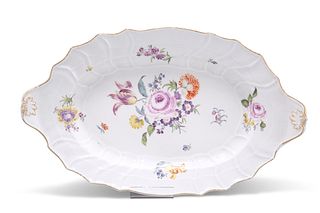 A MEISSEN DISH, CIRCA 1750, shaped oval, painted with floral sprays and spr