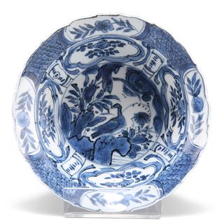 A CHINESE BLUE AND WHITE KRAAK BOWL, WANLI PERIOD, with everted rim, decora