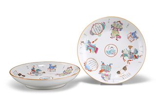 A PAIR OF CHINESE FAMILLE ROSE DISHES, circular, each enamel painted with f