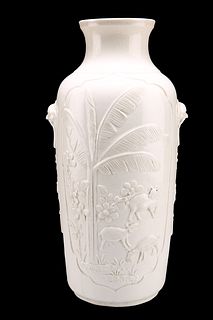 A BLANC DE CHINE VASE, of shouldered ovoid form, moulded with goats and cra