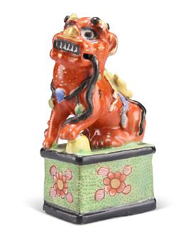 A CHINESE CLOBBERED MODEL OF A FOO DOG, 19TH CENTURY, sturdily modelled sit