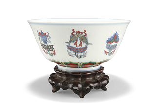 A CHINESE DOUCAI PORCELAIN BOWL, with deep rounded sides raising from a sho