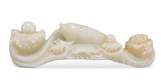 A CHINESE HARDSTONE GROUP, carved with a fish and lotus flower. 20.5cm long