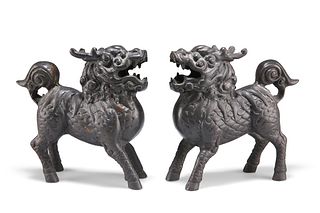 A PAIR OF CHINESE BRONZE MODELS OF QILIN, PROBABLY QING DYNASTY, each cast 