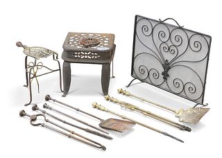 A COLLECTION OF COUNTRY HOUSE METALWORK, including fender, irons, trivet, f