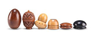 A GROUP OF 19TH CENTURY TREEN, comprising: A CARVED COQUILLA NUT POMANDER; 