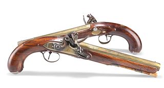 A PAIR OF BRASS BARRELLED FLINTLOCK PISTOLS, mid to late 18th Century, by M