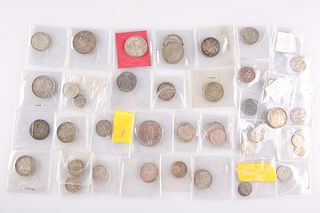 A COLLECTION OF MOSTLY SILVER FOREIGN COINS. (Qty)