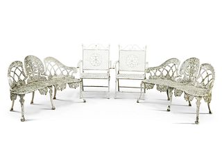 A PAIR OF WHITE PAINTED CAST IRON GARDEN BENCHES, each with pierced shell a