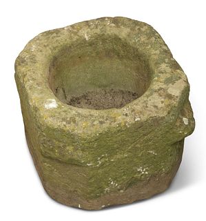 AN OLD WEATHERED STONE PLANTER, square section with canted corners, circula