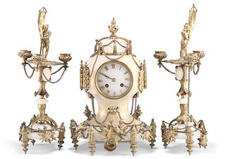 A FRENCH GILT-METAL MOUNTED ONYX CLOCK GARNITURE, 19TH CENTURY, the clock c