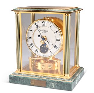 A JAEGER-LECOULTRE ATMOS CLOCK, the case with fluted columns and glazed sid