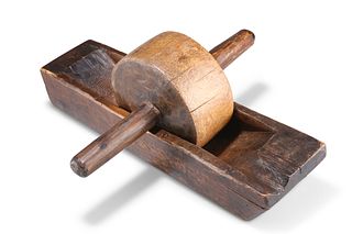 A 19TH CENTURY WOODEN COFFEE GRINDER, of rectangular trough form with a woo