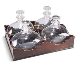 A GEORGE III MAHOGANY DECANTER TRAY, with brass handle and shaped sides/div