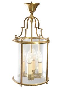 A PERIOD STYLE FOUR-GLASS BRASS HANGING LANTERN, of circular-section. Lengt