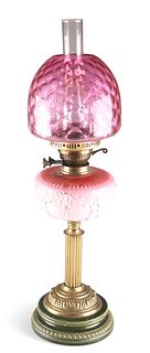 A VICTORIAN POTTERY AND BRASS OIL LAMP, with reeded columnar stem and mould