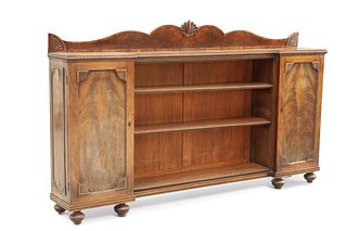 A REGENCY MAHOGANY SIDE CABINET, of inverted breakfront form, with reel mou