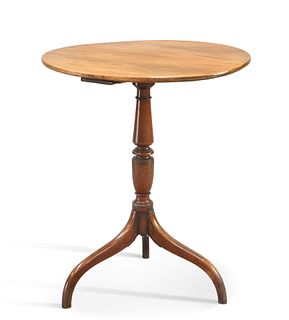 AN EARLY 19TH CENTURY MAHOGANY TRIPOD TABLE, with baluster stem and downswe